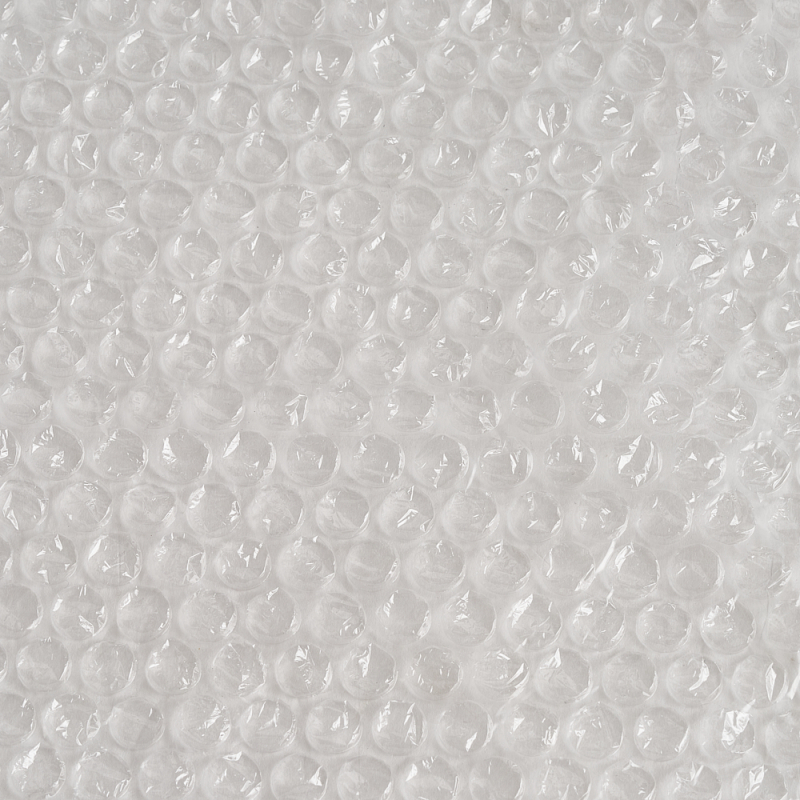 Zbliżenie na strukturę folii bąbelkowej, 3-warstwowej, typ B4 - widoczne pęcherzyki powietrza.